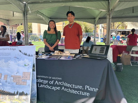 From left, Robyn Nelson and Nathan Becenti tabling at the UArizona's first Powwow since 2016. 