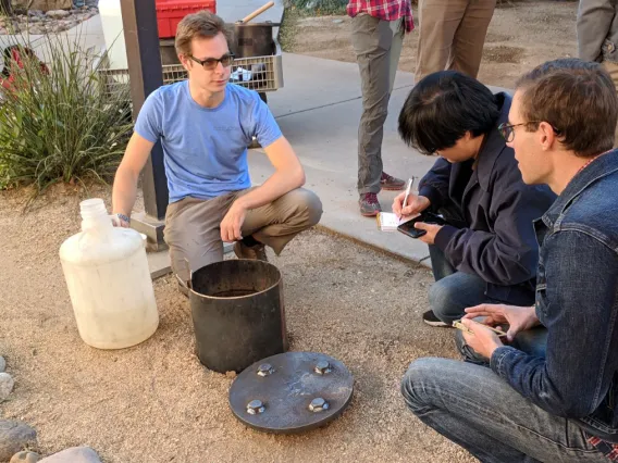 Students conduct a soil percolation test Students conduct a soil percolation test