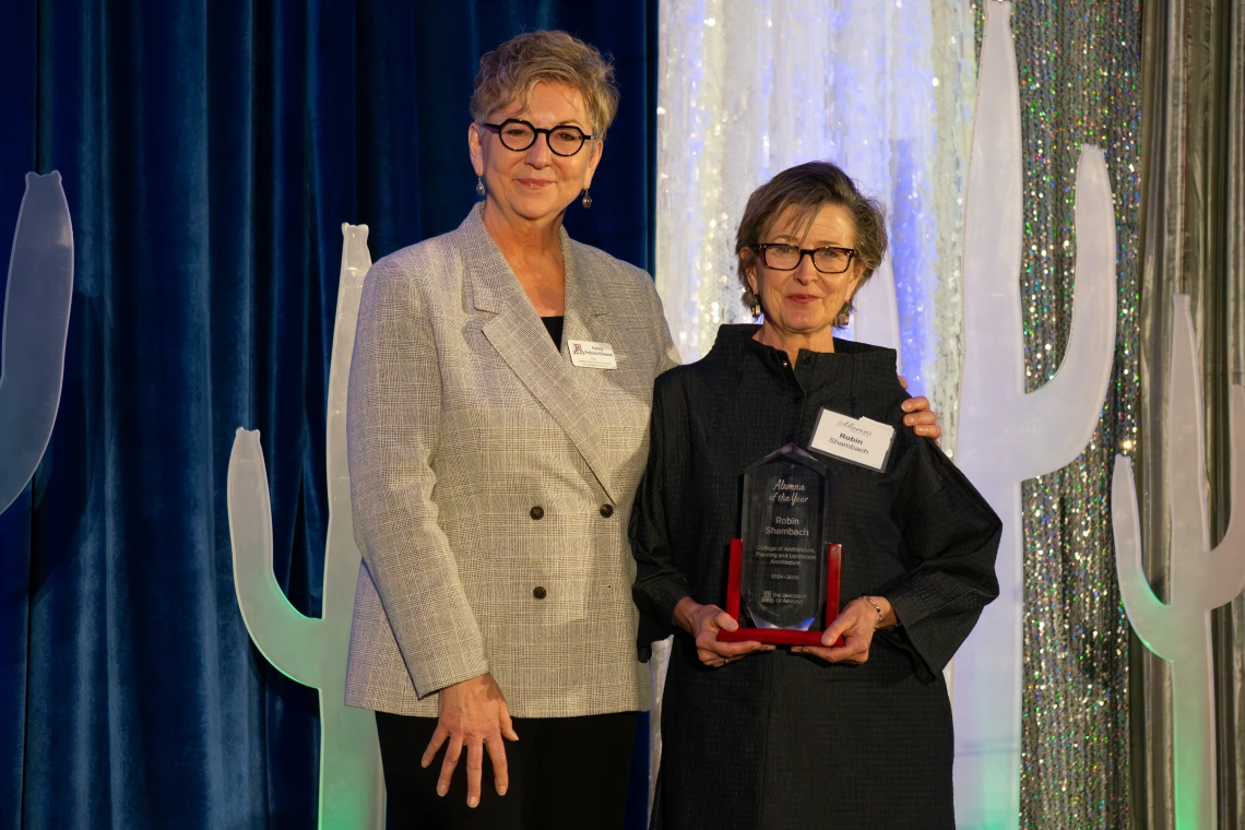 Nancy Pollock-Ellwand and Robin Shambach posing for a photo during the U of A Alumni of the Year event